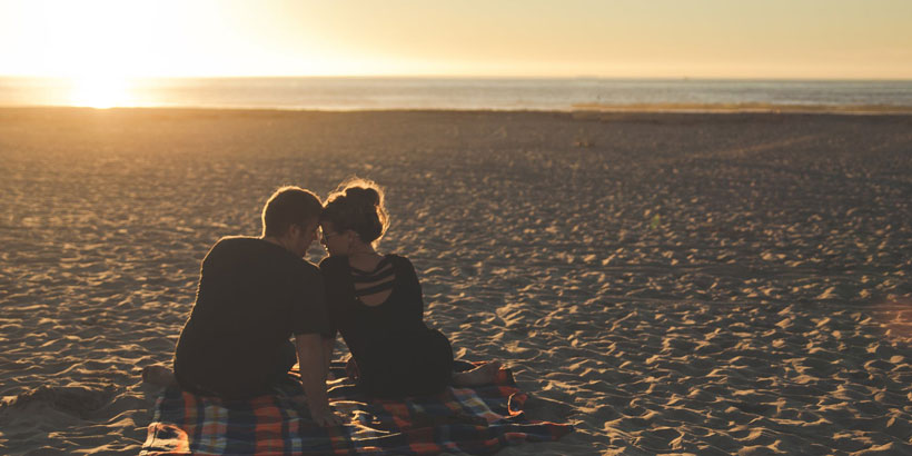 couple on a date at the beach