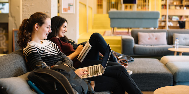 girls sitting at library